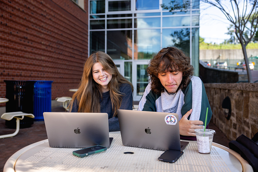 Students take online classes from their laptops