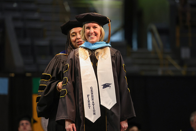 Dr. Jennifer McLean receiving her doctoral hood